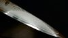 
                    close-up of grained utility knife's blade