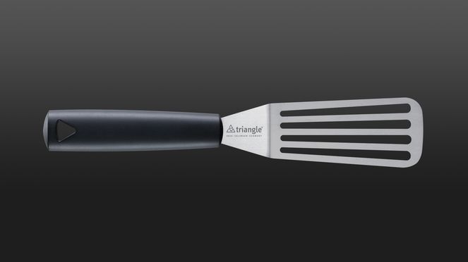 
                    La spatule rainurée de triangle® en acier inoxydable