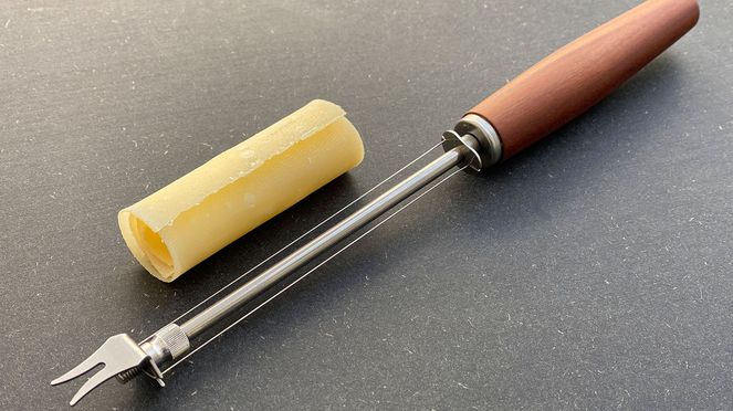 
                    Cheese-slicer for serving cheese slices decoratively